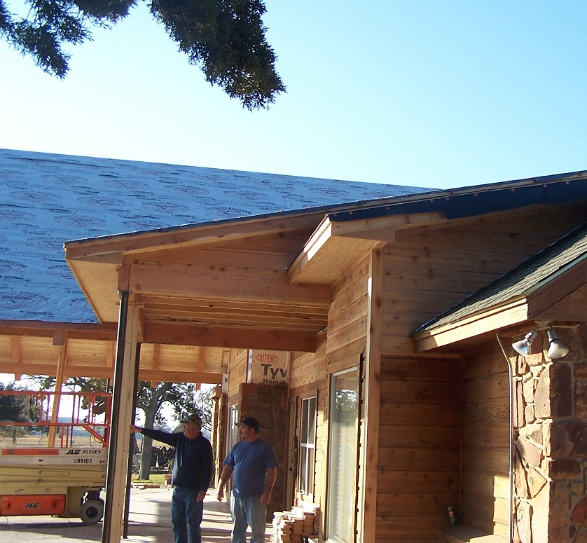 Home addition exterior showing new construction integrated with existing structure — Tincher's Custom Homes